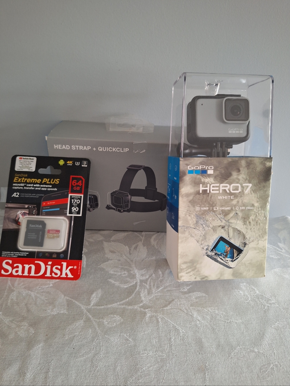 GoPro HERO7 White Action Camera with Black Head Strap & Red SanDisk Card